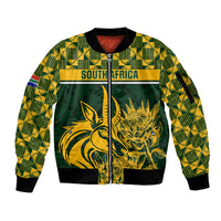 Green zip-up bomber jacket with yellow geometric pattern and gold South Africa animal graphic