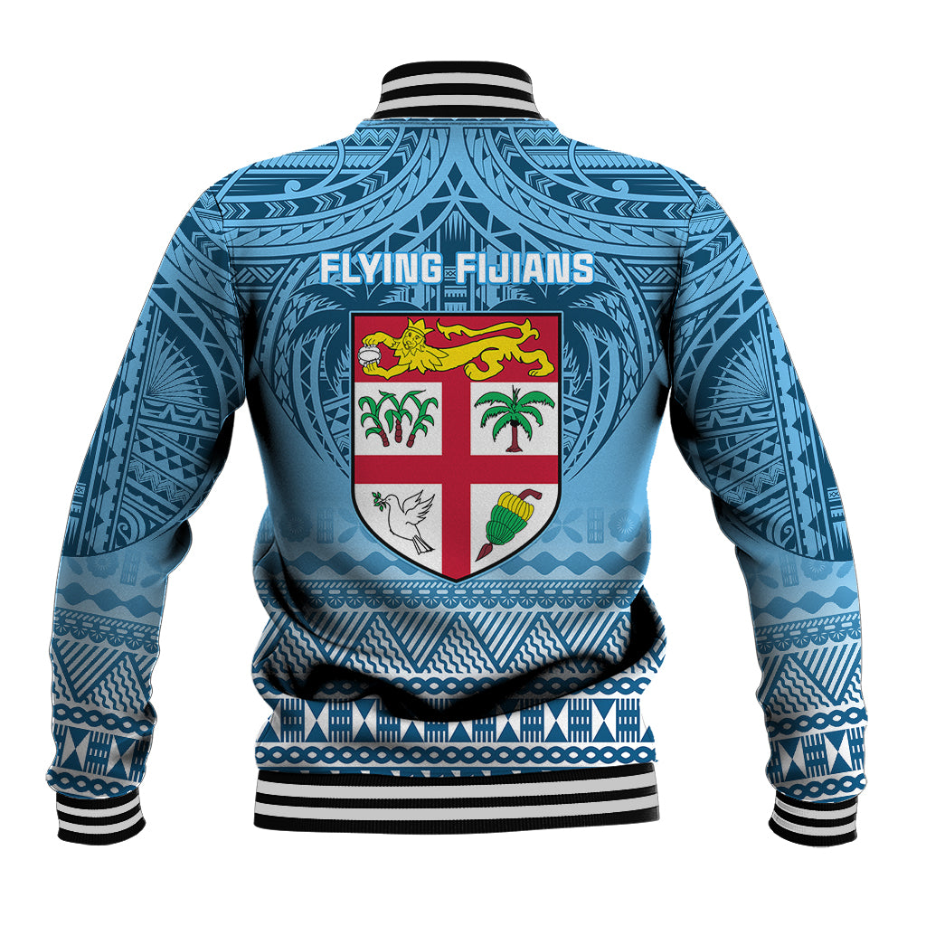 Blue unisex rugby-style varsity jacket back with large crest, patterned sleeves, ribbed hem