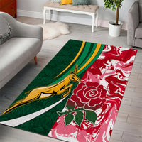 Rectangular area rug with diagonal green stripe bands, gold animal, and red flower