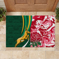 Rectangular green and red rugby doormat with gold kangaroo and white floral swirls