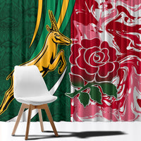 Green and red rugby window curtain with crest graphic and white floral pattern, full length