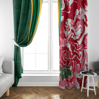Red rugby window curtain with white rose-and-leaf pattern, hanging at window