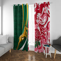 Green and red rugby window curtains with crest and rose motif, hanging near seating