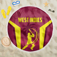 Maroon round beach blanket with white fringe, West Indies logo and text, 150cm