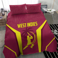 Maroon bedding set on bed with West Indies text, yellow rays, and cricket player emblem