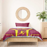 Maroon bedding set with West Indies text on the duvet and two matching pillows