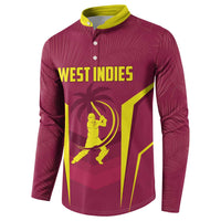 Maroon button-front sweatshirt with yellow collar and West Indies text graphic, long sleeves.