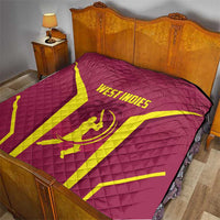 Red West Indies cricket quilt on bed with yellow X lines and WEST INDIES lettering