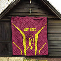 Red West Indies cricket quilt with yellow X pattern and WEST INDIES logo in doorway