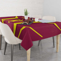 Red tablecloth with yellow frame lines and cricket graphic, draped over table