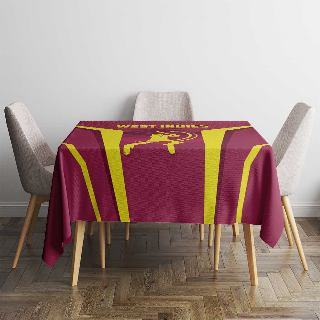 Red West Indies tablecloth with yellow vertical stripe design, laid on dining table