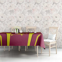 Red and yellow cricket tablecloth over dining table with matching graphic bands