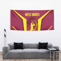 Red West Indies cricket tapestry showing yellow V rays and gold batsman holding bat