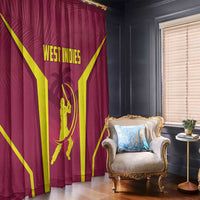 Red West Indies style window curtains with yellow emblem and crisscross sunburst