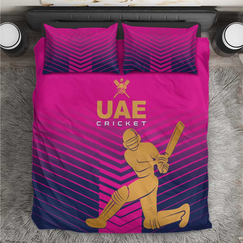 Pink UAE cricket bedding set with gold logo, chevron stripes, and batting player graphic