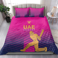 Pink UAE cricket duvet cover and pillowcases with gold logo, chevron stripe pattern
