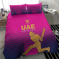 Pink UAE cricket bedding set with gold team logo and batting player print on duvet