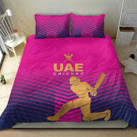Pink UAE cricket duvet and pillowcases featuring gold logo and batting player design
