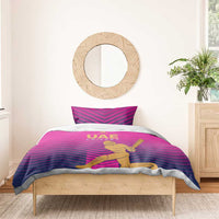Pink UAE cricket duvet with gold logo and chevron stripes, batting player graphic on bed