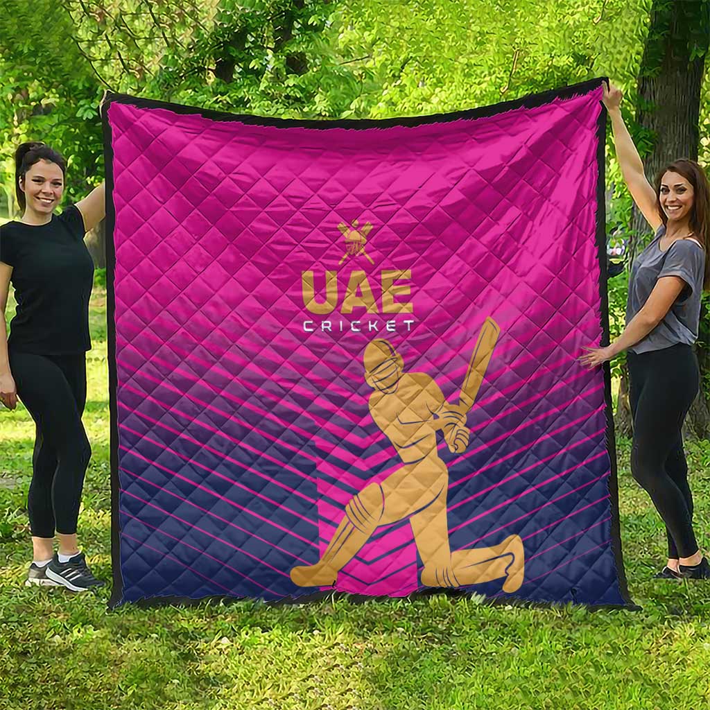 Pink UAE Cricket quilt showing large cricketer graphic and “UAE CRICKET” logo