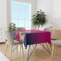 Pink UAE cricket tablecloth draped on dining table with striped gold batsman graphics