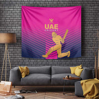 Pink UAE Cricket wall tapestry with gold player and bat graphic.