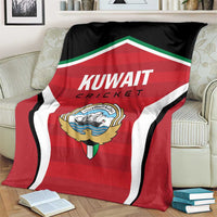 Kuwait Cricket blanket in red, white, and black with large 'Kuwait' lettering