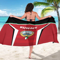Red Kuwait Cricket sarong spread wide, showing center logo and green white border
