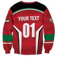 Red cricket sweatshirt back with YOUR TEXT 01 graphic, green trim and crew neck