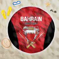 Round beach blanket with red Bahrain Cricket logo, black panels, white fringe