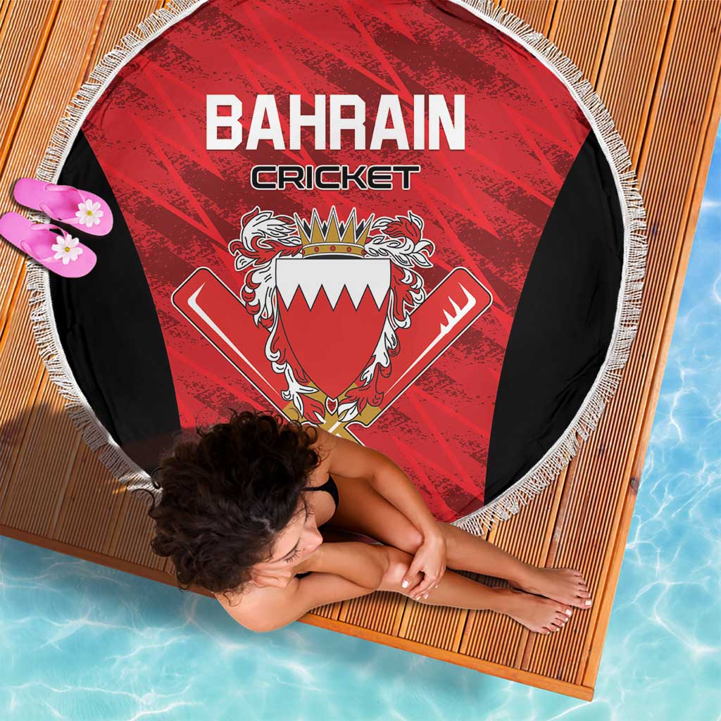 Round beach blanket with Bahrain Cricket text, red crest, black sides, white fringe