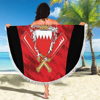 Round beach blanket with Bahrain Cricket crest and bats, red/black design, white fringe