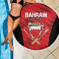 Round beach blanket with Bahrain Cricket text, red shield crest, black sides, white fringe