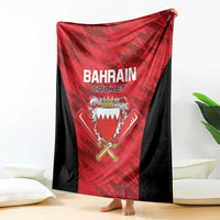 Cricket blanket draped open, red center with Bahrain Cricket text and crest