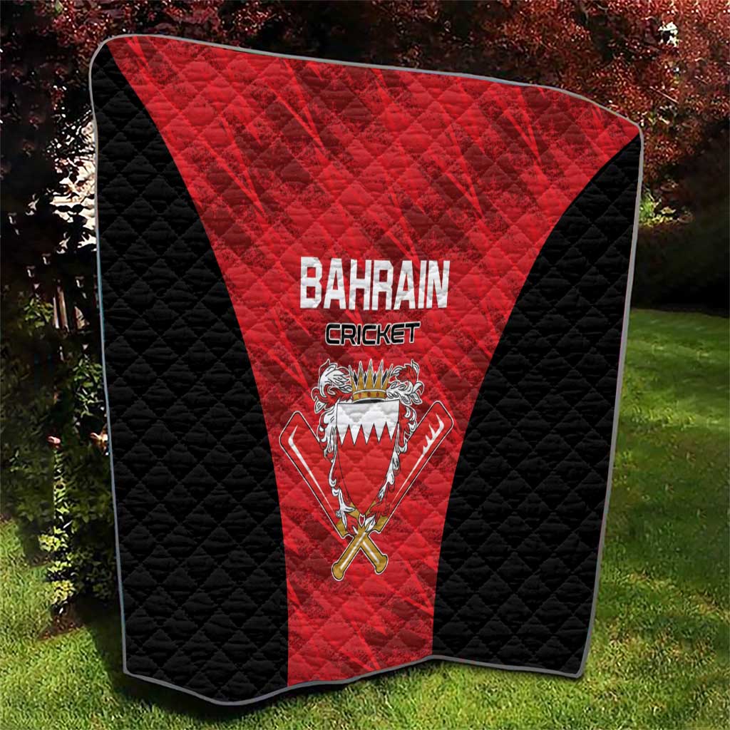 Bahrain cricket quilt draped outdoors, red triangular panel with 'BAHRAIN CRICKET' and crest