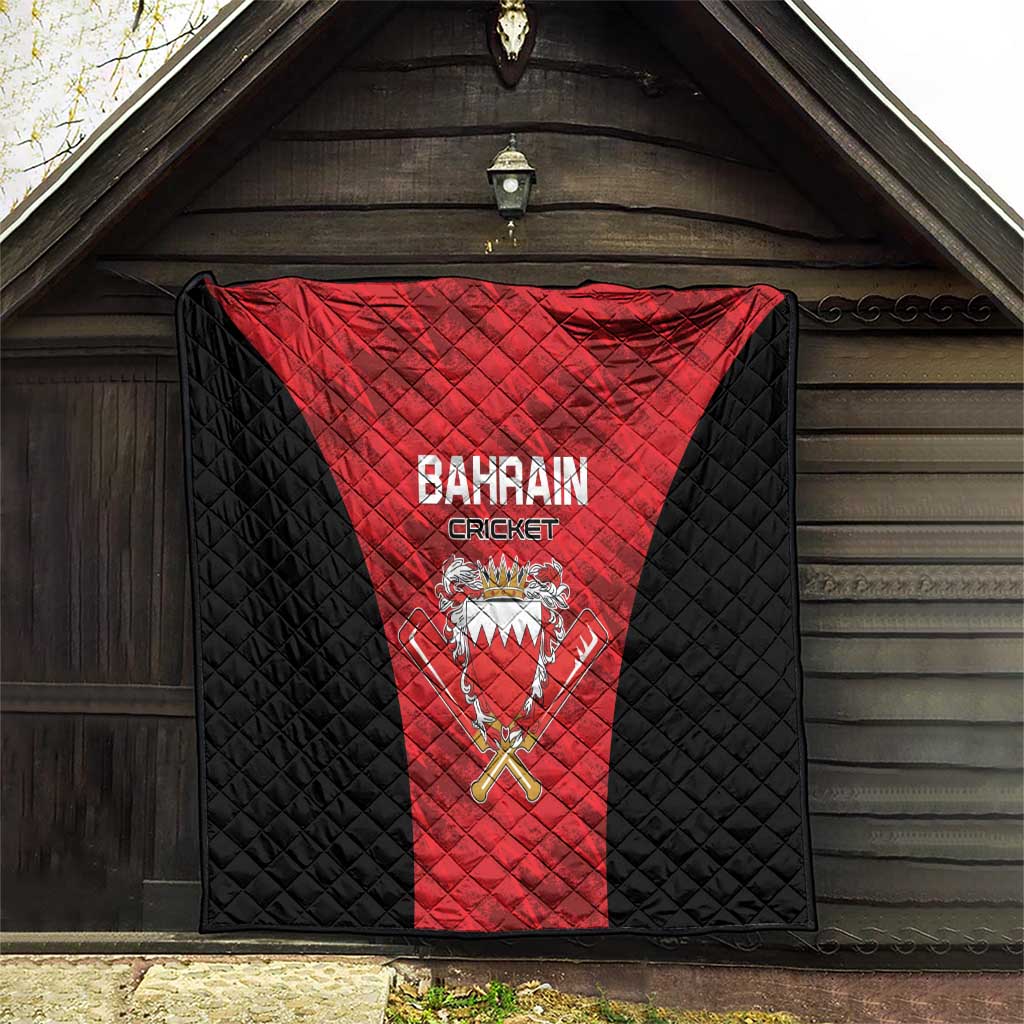 Bahrain cricket quilt hanging on porch, black quilted border with red team logo panel