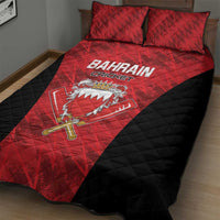 Red and black Bahrain Cricket quilt on bed with shield logo and two red pillow shams.
