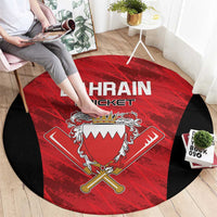 Round red cricket rug with Bahrain Cricket text, shield crest and crossed cricket bats