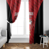 Red and black curtain panels at a window with crest and team text print