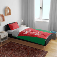 Cricket bedding set for Oman team with white logo on red panel and green bed cover