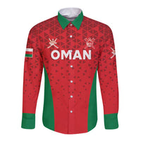 Red long-sleeve button shirt with green collar, OMAN front print, geometric pattern