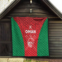 Oman cricket quilt hanging display, red center, green sides, and white “OMAN” logo