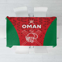 Oman cricket tablecloth, red center with green sides, “OMAN” and helmet crossed-bat design
