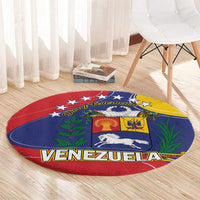 Round Venezuela coat of arms rug in red, blue, and yellow with shield and star details