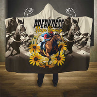 Hooded blanket with large horse racing print, cream hood, dark sides, yellow flower detail