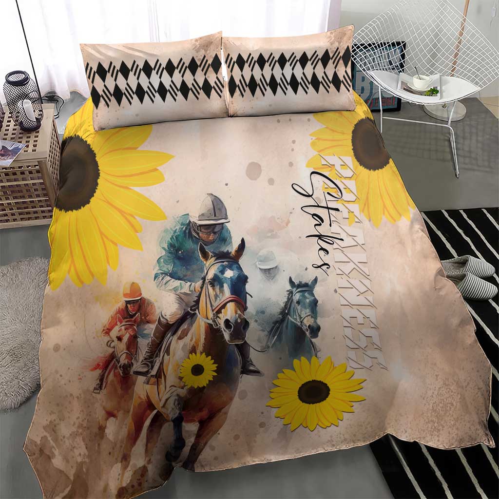 Yellow horse racing bedding set on bed: duvet with sunflowers, plus two black-checkered pillows