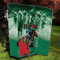 Green quilt with horse rider artwork, diamond pattern, and centered 'BELMONT' lettering