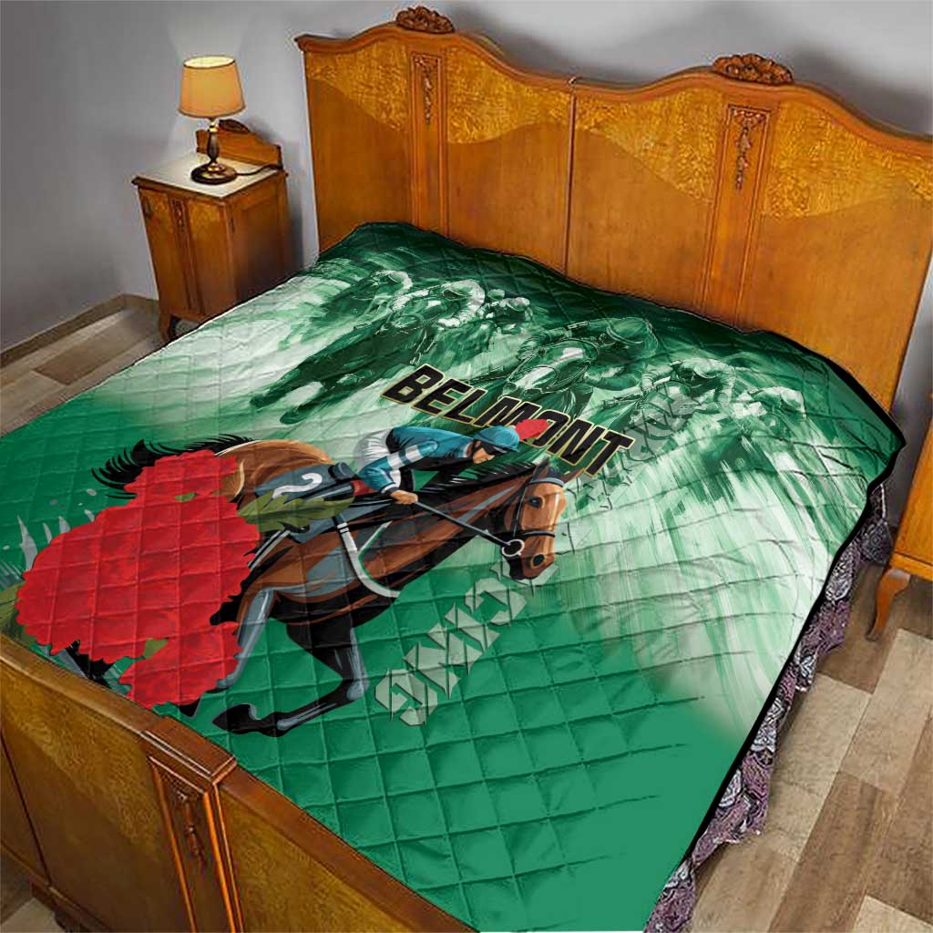 Green horse racing quilt draped on a bed, featuring rider, horse, and 'BELMONT' logo