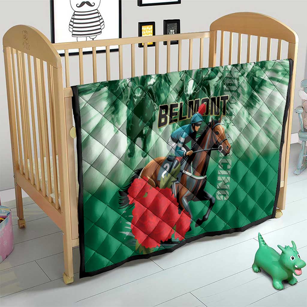 Green quilt on a toddler bed, featuring horse rider graphic with 'BELMONT' lettering