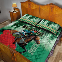 Green horse racing quilt bed set with rider, horse, and red floral patch; two pillow covers